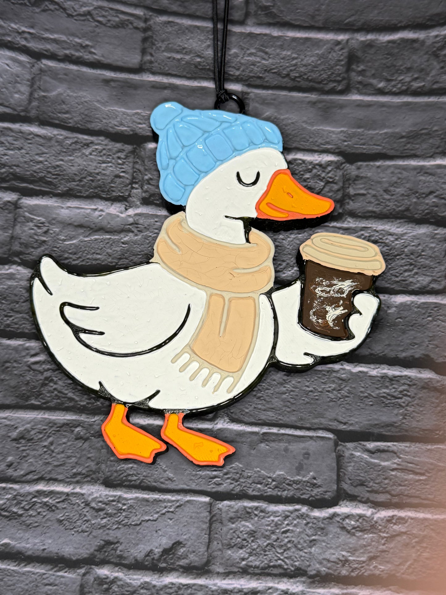 Goose drinking coffee